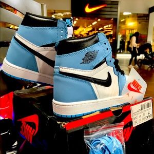 Air Jordan University Blue -BigGirl Size: 5.5Y Unused, with box and spare laces.